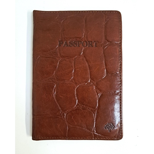 251 - MULBERRY PASSPORT COVER 
in brown embossed mock crocodile leather and with tartan interior