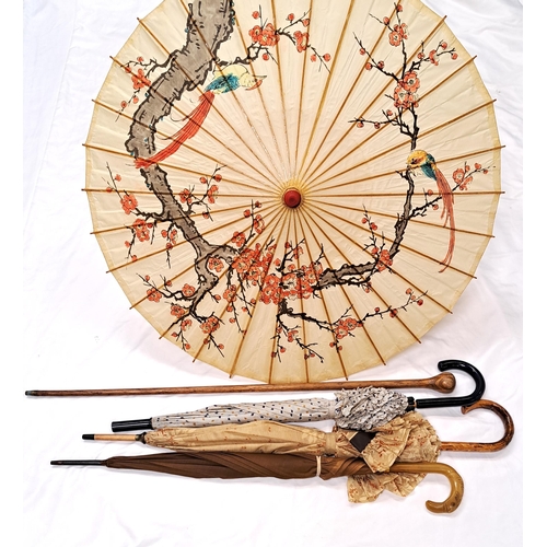 258 - THREE UMBRELLAS, A PARASOL AND A WALKING STICK
the Chinese parasol with hand painted canopy featurin... 