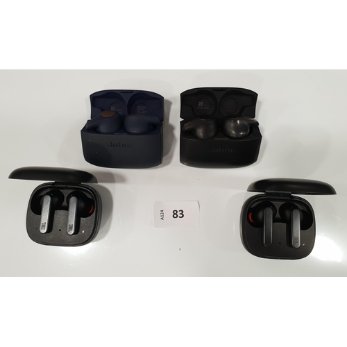 83 - FOUR PAIRS OF EARBUDS IN CHARGING CASES
comprising Jabra and Jbl