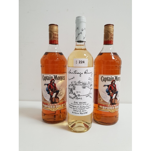 224 - THREE BOTTLES OF WINE AND SPIRITS
comprising two bottles of Captain Morgan Original Spiced Gold (1L,... 