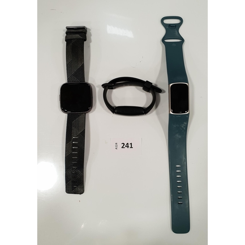 241 - THREE FITBIT FITNESS TRACKERS
comprising a Charge 5, an Inspire 2 and a Versa 2
Note: It is the buye... 