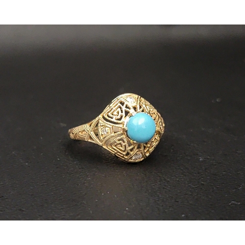 63 - TURQUOISE AND DIAMOND DRESS RING
the round cut cabochon turquoise in pierced diamond set surround ex... 