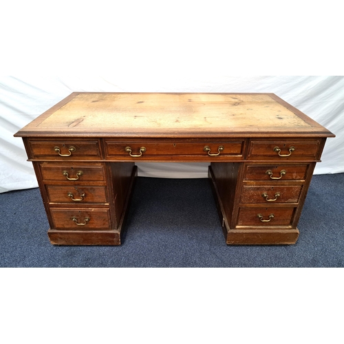 374 - MAHOGANY KNEEHOLE DESK
now lacking the inset leather top, above an arrangement of nine panelled draw... 