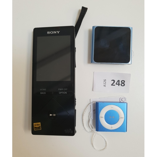 248 - TWO APPLE IPODS AND A SONY WALKMAN
comprising a Ipod Shuffle, 2GB, s/n CC4T25N9GK69; Ipod Nano, 8GB,... 