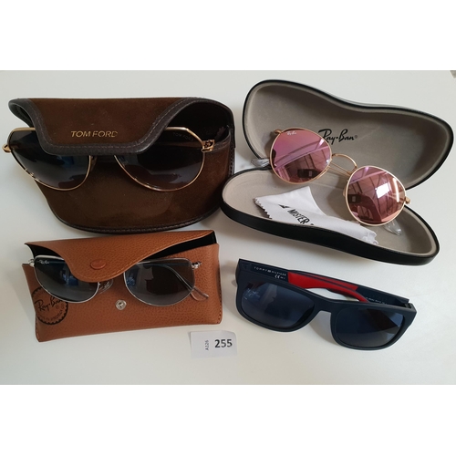 255 - FOUR PAIRS OF DESIGNER SUNGLASSES
comprising two pairs of Ray-Ban, one pair of Tom Ford and one pair... 