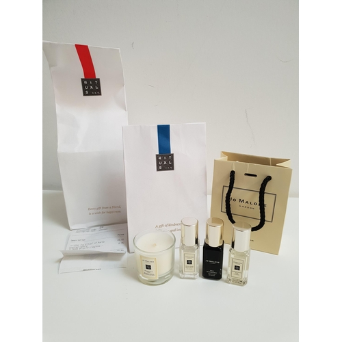 276 - TWO NEW ITEMS BY RITUALS
comprising a Karma scented candle and Miracle Lip gloss - Vintage Rose, bot... 