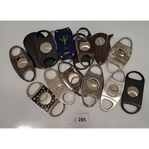 285 - SELECTION OF CIGAR CUTTERS
of various size and design (15)
Note: You must be over the age of 18 to b... 