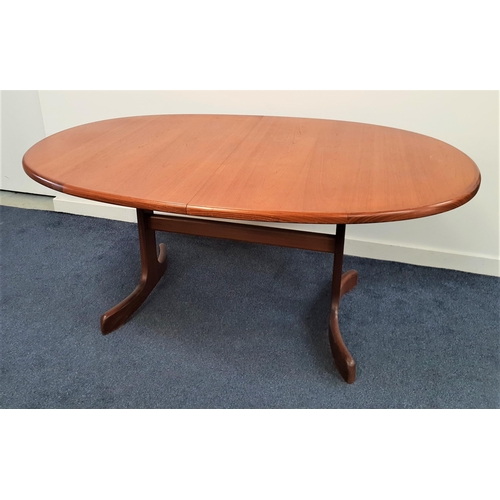 339 - G PLAN TEAK EXTENDING DINING TABLE
with a D end pull apart top and fold out leaf, standing on shaped... 