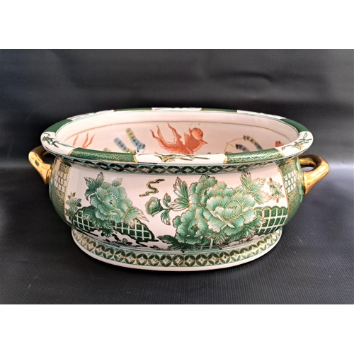 194 - CHINESE FAMILLE VERT FOOT BATH
with parcel gilt handles, the interior decorated with koi carp, the b... 