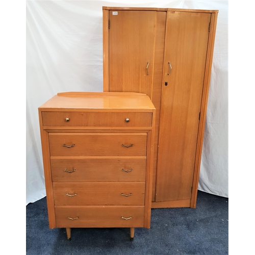 363 - C.W.S. LTD WARDROBE AND MATCHING CHEST OF DRAWERS
the wardrobe with a pair of shaped doors opening t... 