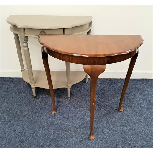 364 - WALNUT D SHAPED HALL TABLE
with a wavy edge and standing on slender cabriole supports, 72.5cm high, ... 