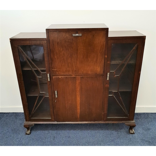 409 - 1930s OAK SIDE CABINET
with a central fall flap opening to reveal a fitted interior with a cupboard ... 