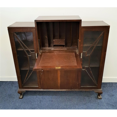 409 - 1930s OAK SIDE CABINET
with a central fall flap opening to reveal a fitted interior with a cupboard ... 