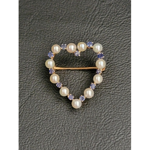 65 - SAPPHIRE AND PEARL HEART SHAPED BROOCH
in unmarked gold (tests as 14/15 carat), 2.1cm wide