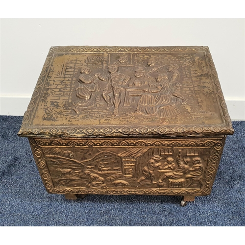 217 - BRASS COAL BIN
with a sloping lid and steel liner, decorated with embossed tavern scenes, on casters... 