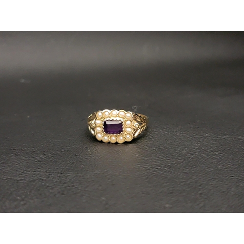 54 - AMETHYST AND PEARL CLUSTER RING 
the central horizontally set rectangular cut amethyst in a fourteen... 