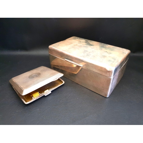 157 - GEROGE V SILVER CIGARETTE BOX AND CASE
the rectangular box with cedar lined interior, Birmingham 193... 