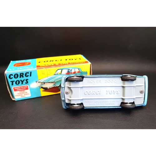 283 - CORGI TOYS No. 252 ROVER 2000 
with blue body and red interior, spring suspension, Trans o Lite head... 