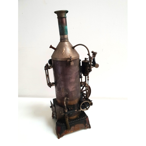 227 - VINTAGE STEAM ENGINE AND PUMP
with a fly wheel and pressure valve, 40cm high