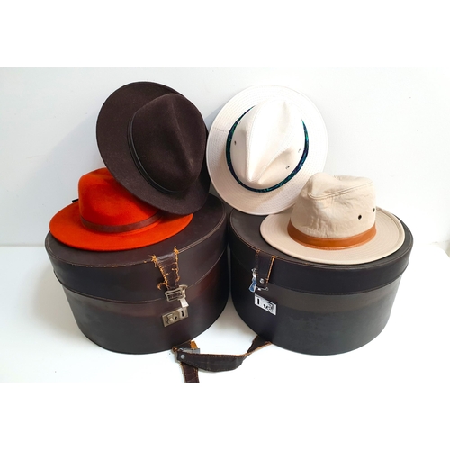 273 - SELECTION OF FOUR HATS
including a 100% orange wool hat by Harkins, size 57cm; a Dorfman Pacific hat... 