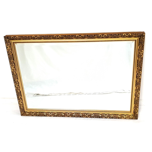 432 - LARGE GILTWOOD WALL MIRROR
with a rectangular bevelled plate, 69cm x 96.5cm