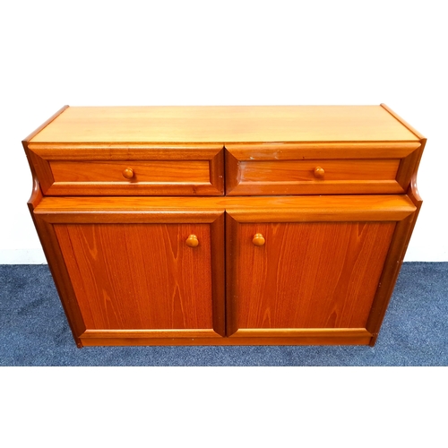 435 - SUTCLIFFE TEAK SIDE CABINET
with a rectangular top with two panelled drawers above two panelled cupb... 