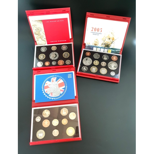 292 - THREE ROYAL MINT UNITED KINGDOM DELUXE PROOF COIN SETS
2003, 2004 and 2005, all with booklets