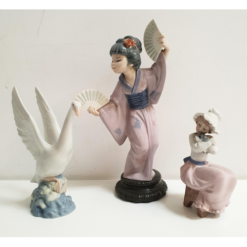 193 - LLADRO GEISHA FIGURINE AND TWO NAO FIGURINES
the geisha with two fans and flowers in her hair, 30.5c... 