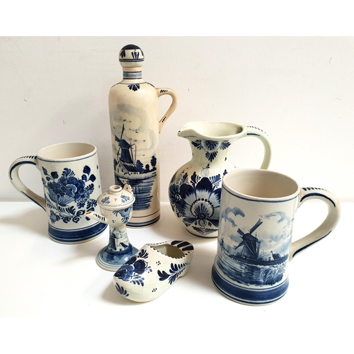 204 - SELECTION OF DUTCH DELFT WARES
including two tankards, clog, bottle and stopper, jug and water jug