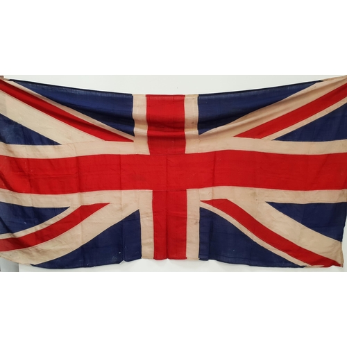 212 - LARGE VINTAGE BRITISH UNION FLAG
of fabric construction with fixings to one end, approximately 270cm... 