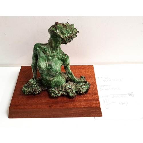 242 - CLIVE VINCENT JACHNIK
The Sunbather, green glaze ceramic on a mahogany plinth, 22cm high