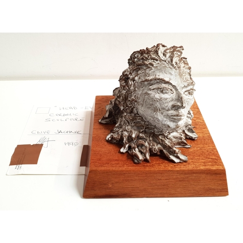 245 - CLIVE VINCENT JACHNIK
Head-Eva, white glaze ceramic on a mahogany plinth, 13cm high