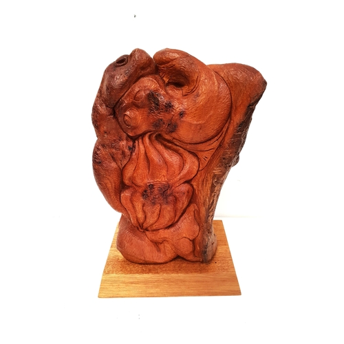 246 - CLIVE VINCENT JACHNIK
Entwined beasts, carved yew on a mahogany plinth, 35cm high