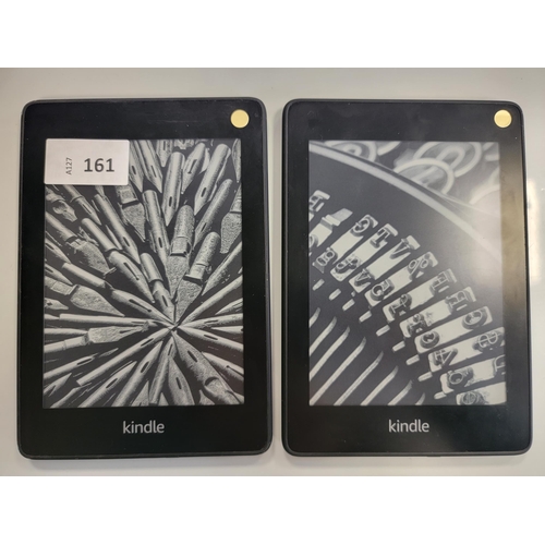 161 - TWO AMAZON KINDLE E-READERS
comprising two Paperwhite 4, serial numbers G000 PP12 9423 074C, G000 PP... 