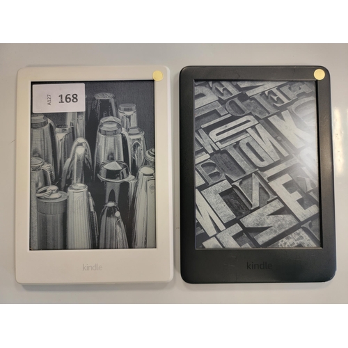 168 - TWO AMAZON KINDLE E-READERS
comprising a Basic 3, serial number G091 0L03 9086 01PX; and a Basic 2, ... 