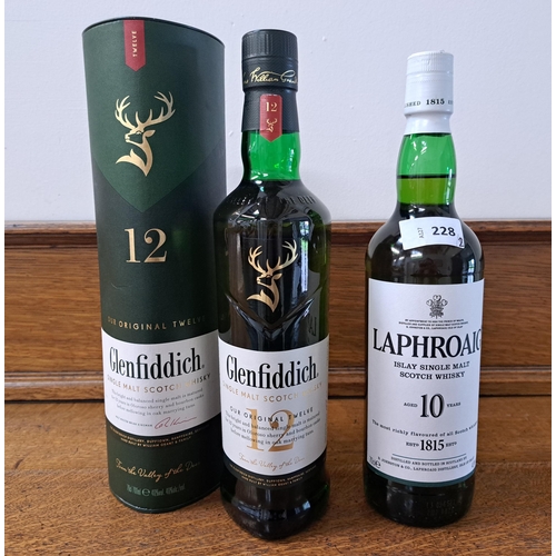 228 - TWO BOTTLES OF WHISKY
comprising Laphroaig Islay 10 year Single Malt Scotch Whisky (70ml, 40%) and b... 