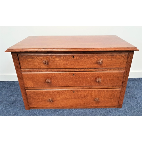 340 - OAK LOW CHEST OF DRAWERS
with a moulded top above three drawers, standing on a plinth base, 56.5cm x... 