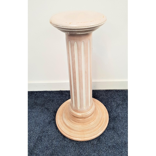 343 - LIMED OAK PEDESTAL
raised on a circular stepped base with a carved column and circular top, 71cm hig... 