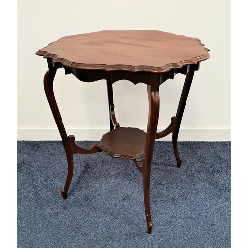 366 - EDWARDIAN MAHOGANY WINDOW TABLE
with a circular shaped top and frieze, standing on cabriole supports... 