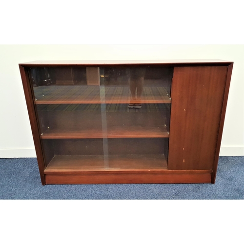 368 - GIBBS TEAK SIDE CABINET
with a rectangular top above a pair of glass sliding doors and a cupboard do... 