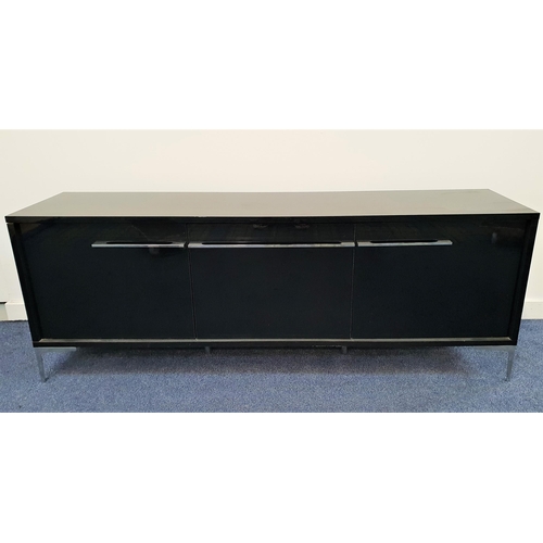 372 - HIGH GLOSS BLACK SIDEBOARD
with a rectangular top above three cupboard doors with steel handles, sta... 