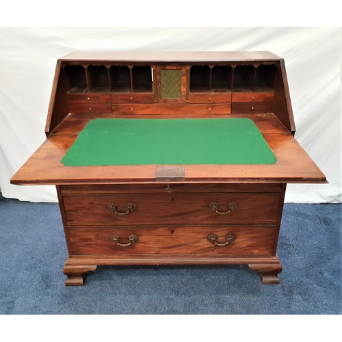 402 - GEORGE III MAHOGANY BUREAU
the fall flap with an inset baize and fitted interior, above two short an... 