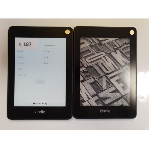 187 - TWO AMAZON KINDLE E-READERS
comprising two Paperwhite 4, serial numbers G000 PP12 9183 00V4, G000 PP... 