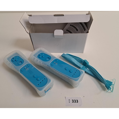 333 - TWO NEW BLUE WII REMOTES 
by Techken, model TK105