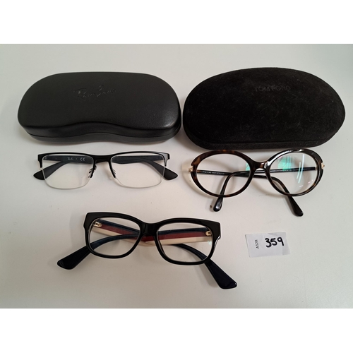 359 - THREE PAIRS OF DESIGNER GLASSES
comprising Tom Ford, Ray-Ban and Gucci, Gucci without a case