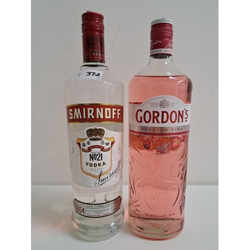 372 - TWO BOTTLES OF SPIRITS
comprising Gordon's Premium Pink gin (1L, 37.5%) and Smirnoff Vodka (1L, 37.5... 