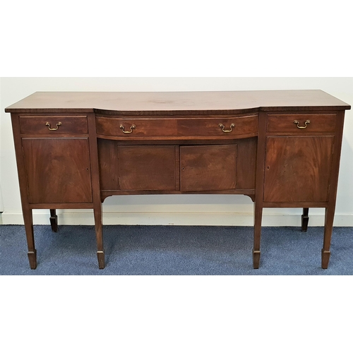LYALL AND JOHNSTON MAHOGANY BREAKFRONT SIDEBOARD
with three frieze drawers above a central double cupboard door and flanked by a further pair of cupboard doors, standing on tapering supports with spade feet, 98cm x 181cm