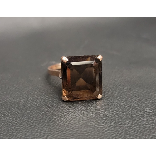 68 - LARGE SMOKY QUARTZ DRESS RING
the rectangular cut gemstone measuring 14.6mm x 13mm x 7.8mm  in pierc... 