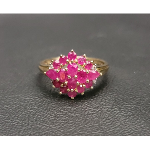 114 - RUBY AND DIAMOND CLUSTER RING
the multiple diamonds totalling approximately 1.7cts, with four small ... 