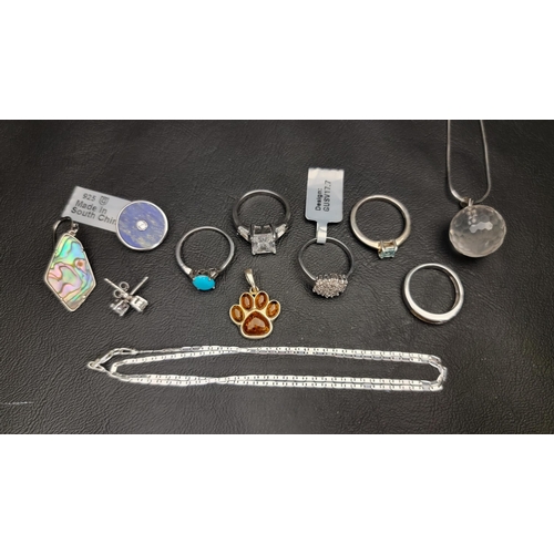 92 - SELECTION OF GEM AND STONE SET SILVER JEWELLERY
including a blue topaz single stone ring, a circular... 